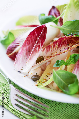 Photo: Chicory salad with capers and basil leaves Chicory salad with capers and basil leaves