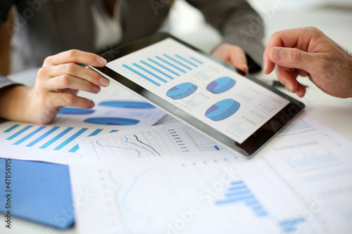 Photo: Business plan presentation on digital tablet Business plan presentation on digital tablet