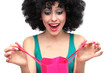 Woman with afro looking into shopping bag