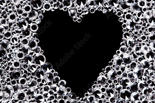 Photo: Diamond background with heart shaped space. Diamond background with heart shaped space.