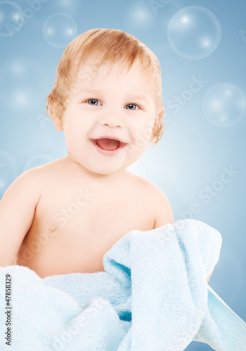 Photo: baby with blue towel baby with blue towel
