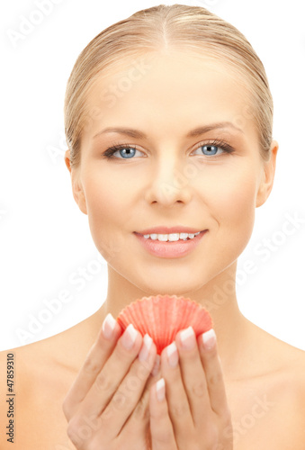 Photo: beautiful woman with seashell beautiful woman with seashell