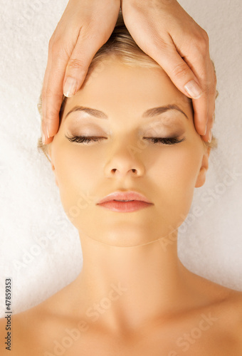 Photo: beautiful woman in massage salon beautiful woman in massage salon