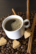 coffee beans, cup, Pots, cinnamon on dark background