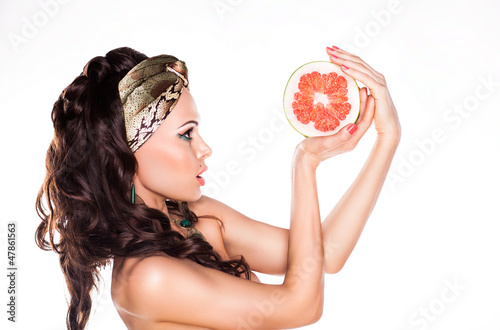 Photo: Beauty Young Woman Brunette Preferring Low Calorie Food - Citrus Beauty Young Woman Brunette Preferring Low Calorie Food - Citrus