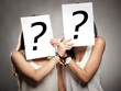 young women with interrogation symbols