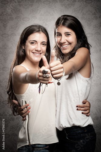 Photo: girls with thumbs up girls with thumbs up
