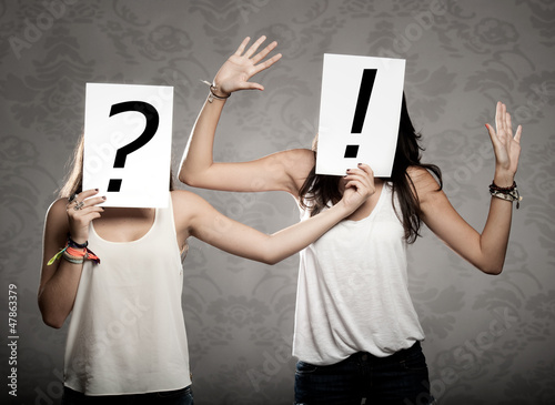 Photo: women with interrogation symbols in front of their faces women with interrogation symbols in front of their faces
