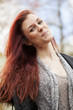 Young Woman with Beautiful Auburn Hair