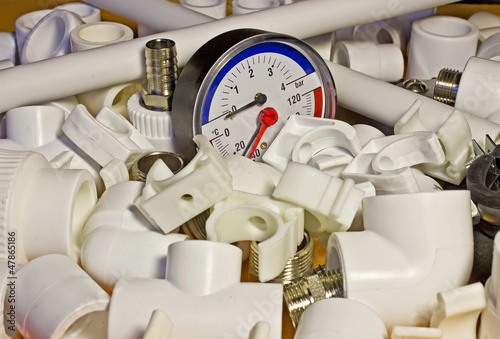 Photo: Polypropylene fittings for system of heating and pressure gauge Polypropylene fittings for system of heating and pressure gauge