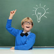 Schoolboy at the Blackboard with Idea