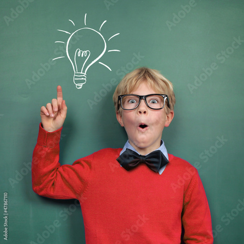 Photo: Schoolboy at the Blackboard with Idea Schoolboy at the Blackboard with Idea