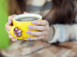  cup in woman hands