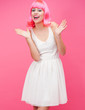Beautiful young woman over pink background