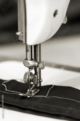 Photo: Sewing cloth with sewing machine Sewing cloth with sewing machine