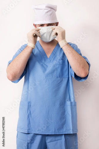 Photo: Surgeon in scrubs in scrubs Surgeon in scrubs in scrubs