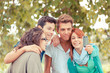 Group of Teenage Friends Taking Self Portraits with Mobile Phone