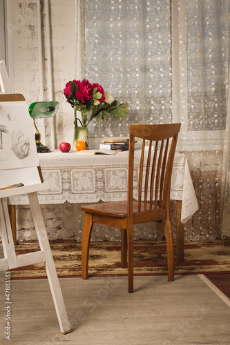 Photo: Vintage living room with old fashioned table and chair Vintage living room with old fashioned table and chair