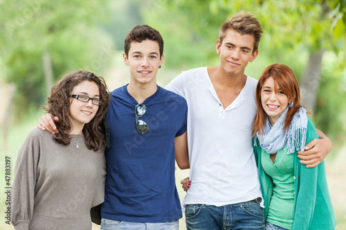 Photo: Group of Teenage Friends Outdoor Group of Teenage Friends Outdoor