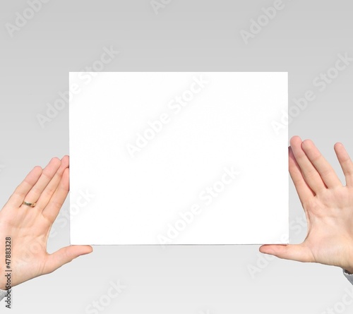 Photo: Hände halten Schild Hände halten Schild