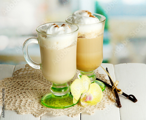 Photo: Fragrant coffee latte in glasses cups with spices, Fragrant coffee latte in glasses cups with spices,