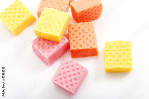 Photo: colorful fruit caramel candy close-up on white background colorful fruit caramel candy close-up on white background