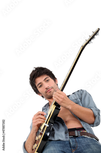 Photo: Male guitarist Male guitarist