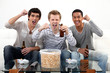 buddies watching football match on telly