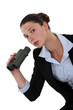 Woman holding a pair of binoculars