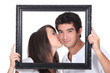 Girl tenderly kissing a man