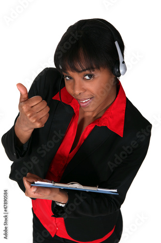 Photo: Call-center worker giving thumbs-up Call-center worker giving thumbs-up