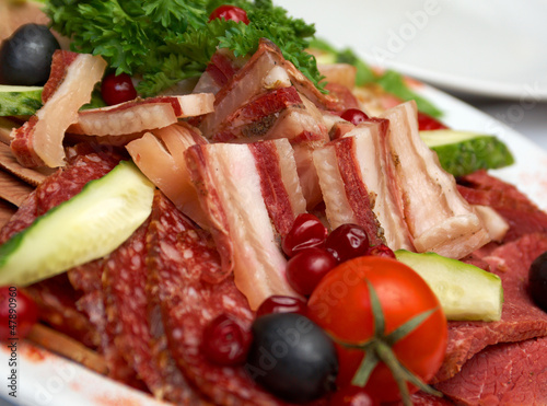 Photo: Beautiful sliced food arrangement of meat Beautiful sliced food arrangement of meat