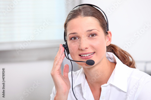 Photo: Young man with headphones and microphone Young man with headphones and microphone