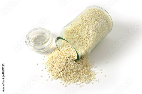 Photo: Rice spilling from jar Rice spilling from jar