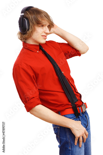 Photo: Happy smiling young man dancing Happy smiling young man dancing