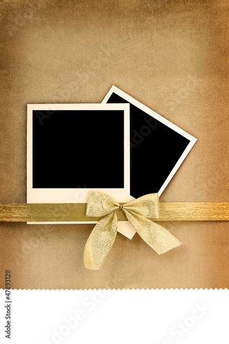 Photo: Polaroid photo frame on vintage background Polaroid photo frame on vintage background