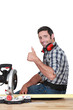 Approving tradesman using a mitre saw