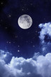 cloudy night sky with moon and star