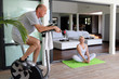 Elderly couple working out at home