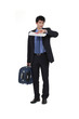 Business with luggage late for meeting