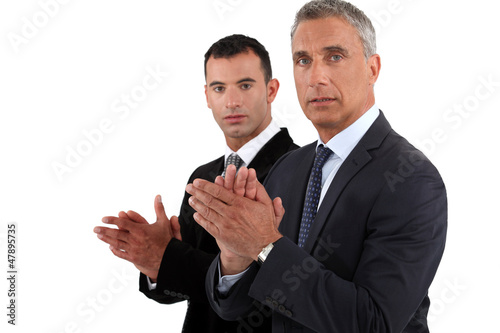 Photo: Businessmen clapping their hands Businessmen clapping their hands