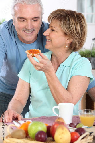 Photo: Senior couple having breakfast Senior couple having breakfast