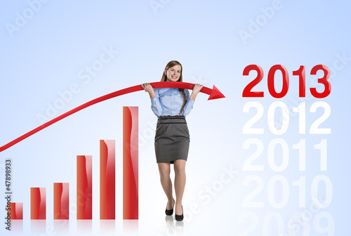 Photo: Woman with statistics curve Woman with statistics curve