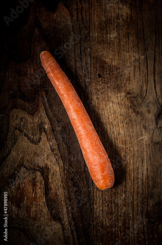 Photo: carrot on wood carrot on wood