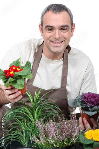 Photo: A gardener with his plants A gardener with his plants