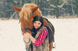 Photo: Woman with a Horse the Snow Woman with a Horse the Snow