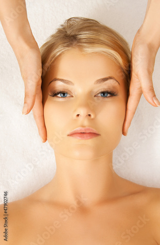 Photo: beautiful woman in massage salon beautiful woman in massage salon