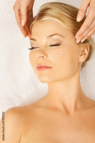 Photo: beautiful woman in massage salon beautiful woman in massage salon