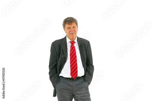 Photo: smart succesful business man with red tie and black suit smart succesful business man with red tie and black suit