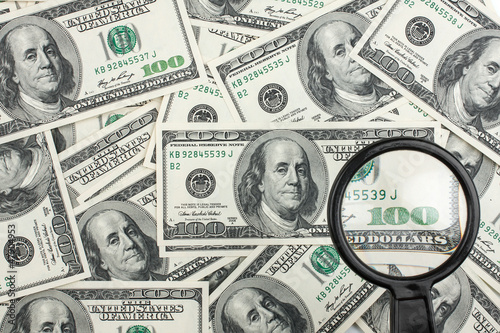 Photo: Look through a magnifying glass on the money Look through a magnifying glass on the money